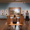 Visitors view Constable’s The Hay Wain at Bristol Museum & Art Gallery as part of National Treasure